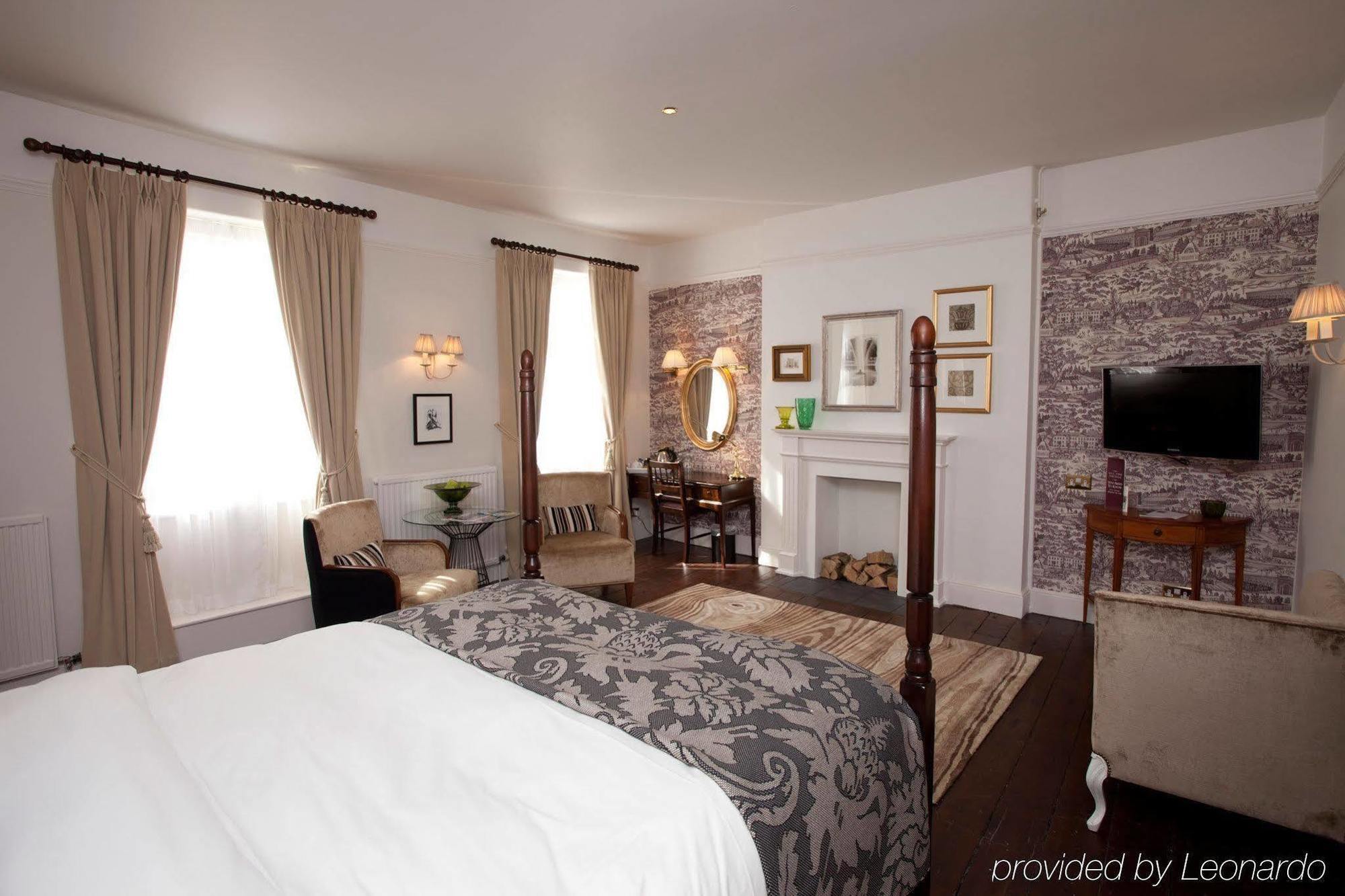 The Fleece At Сайренстер Номер фото A room at the hotel